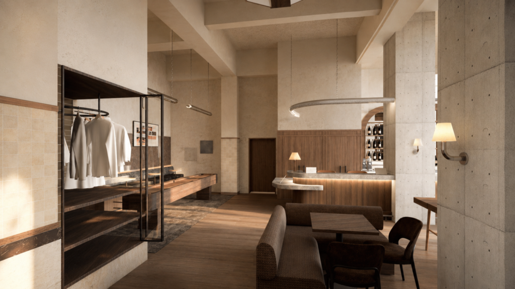 Modern boutique interior with a clothing rack, wooden shelves, and a curved bar in warm lighting